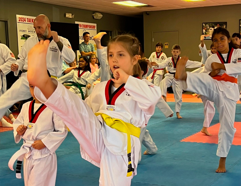 children in a group taekwondo class