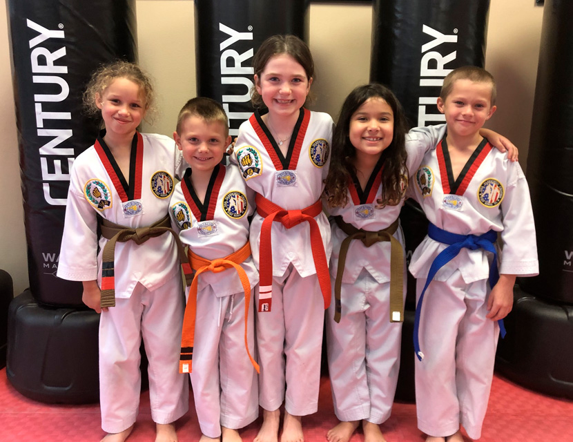 happy children after a class in the taekwondo children program